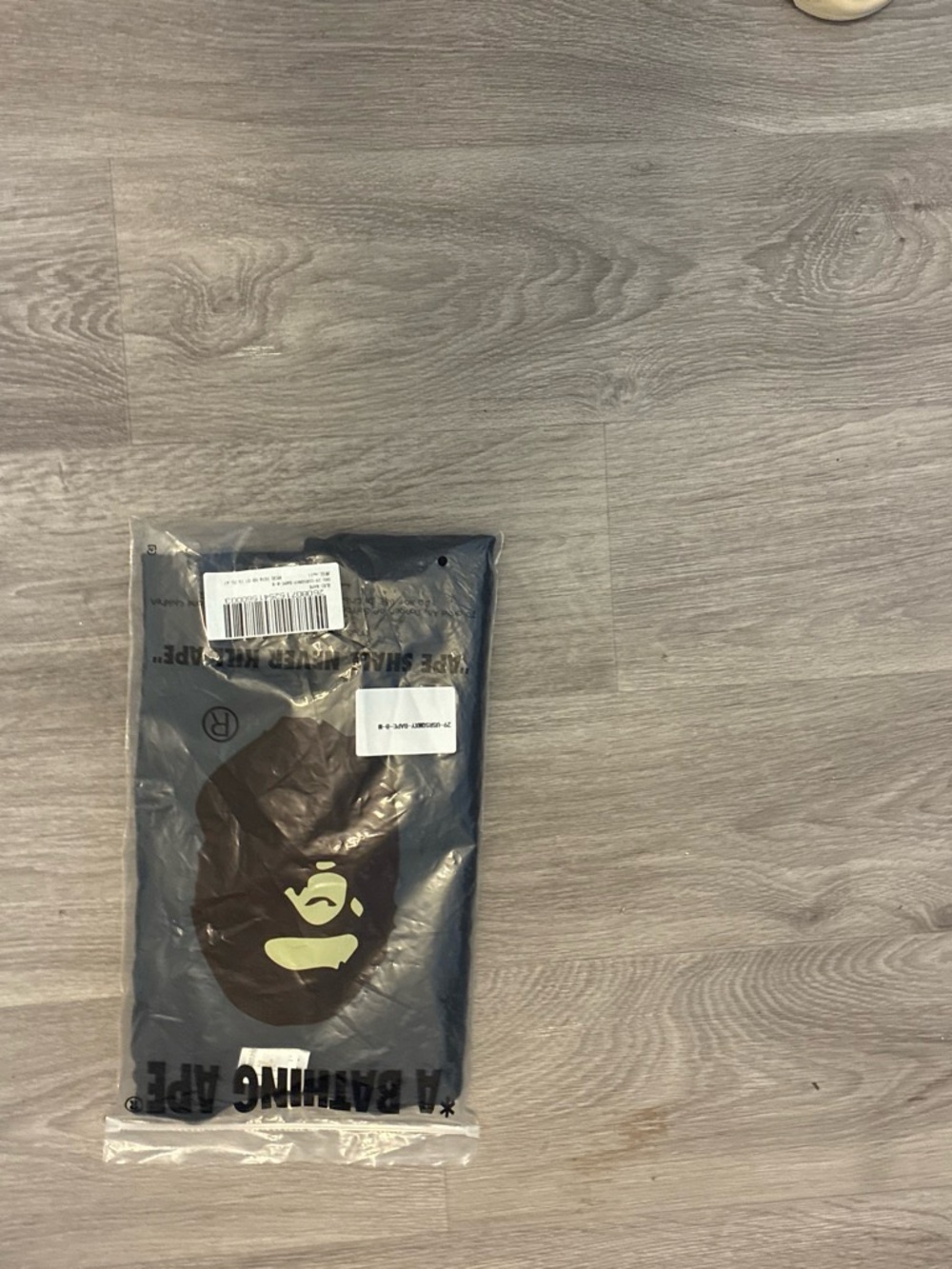 Bape Short Sleeve Graphic Tee in Black with Brown & Cream Ape Logo